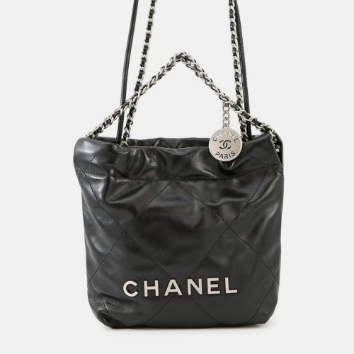 Chanel 22 Mini Handbag With Coco Mark Shiny Calfskin Leather Black - Chanel - Modalova