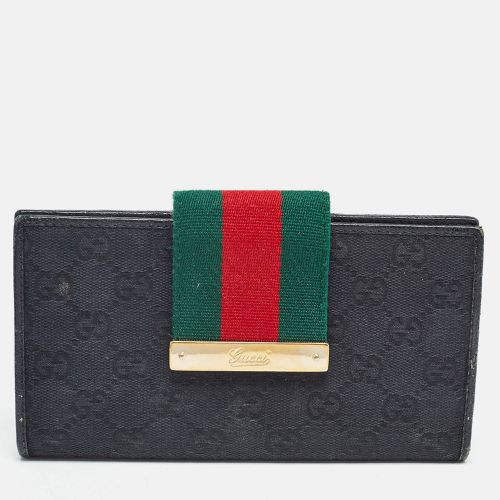 Gucci Black GG Canvas and Leather Web Flap Wallet - Gucci - Modalova