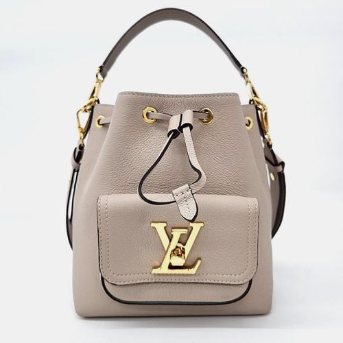 Louis Vuitton Grey Beige Leather LockMe Bucket Bag - Louis Vuitton - Modalova