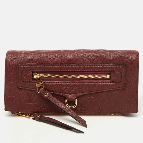 Louis Vuitton Aurore Monogram Empreinte Leather Petillante Clutch - Louis Vuitton - Modalova