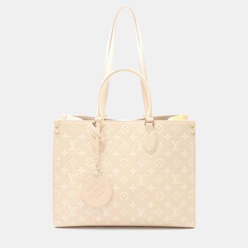 Louis Vuitton OnTheGo MM Rose Beige Monogram Empreinte Leather Tote Bag - Louis Vuitton - Modalova