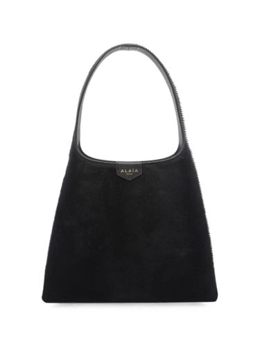 Alaïa Leather Mini Hobo Bag - Alaïa - Modalova