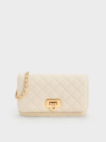Cressida Gesteppte Clutch mit Push-Lock-Verschluss - Charles & Keith - Modalova