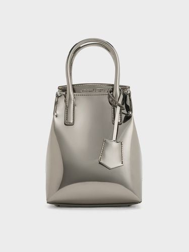 Charles & Keith - Rene Metallic Elongated Top Handle Bag - Charles & Keith - Modalova