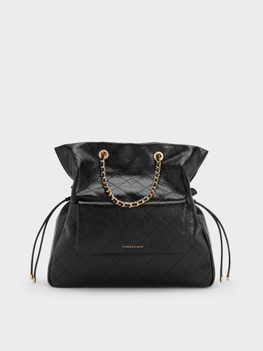 Charles & Keith - Duo Rucksack mit gesteppten, geflochtenen Trägern und Kordelzug, zwei Tragevarianten - Charles & Keith - Modalova