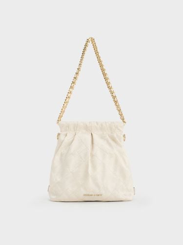 Charles & Keith - Duo Jacquard Chain-Handle Two-Way Backpack - Charles & Keith - Modalova