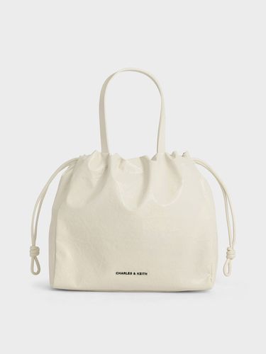 Charles & Keith - Mini Bethel Crinkle-Effect Ruched Drawstring Tote Bag - Charles & Keith - Modalova