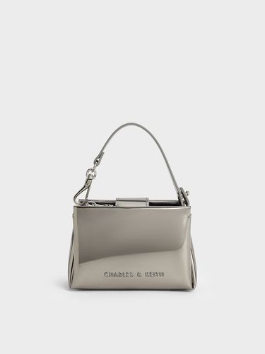 Charles & Keith - Bosie Metallic Top Handle Pouch - Charles & Keith - Modalova