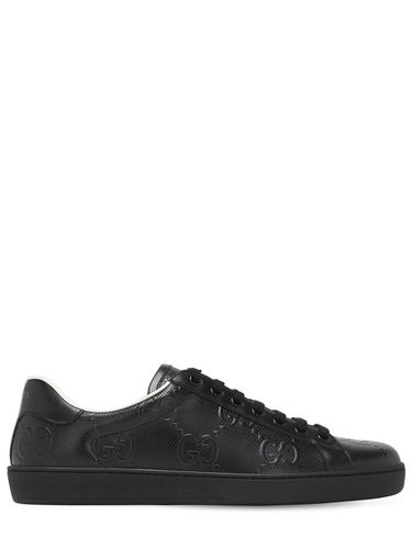 New Ace Gg Embossed Leather Sneakers - GUCCI - Modalova