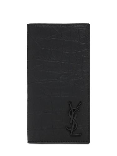 Monogram Embossed Continental Wallet - SAINT LAURENT - Modalova