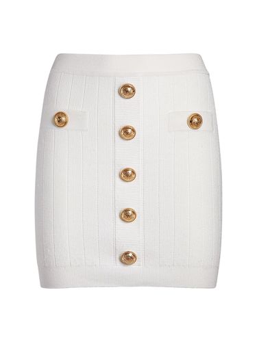 Ribbed Knit Mini Skirt W/ Buttons - BALMAIN - Modalova