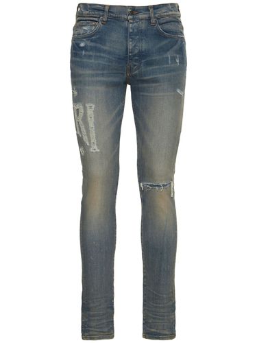 Amiri Logo Distressed Jeans - AMIRI - Modalova