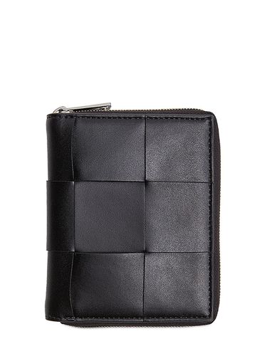 Intrecciato Leather Zip Around Wallet - BOTTEGA VENETA - Modalova