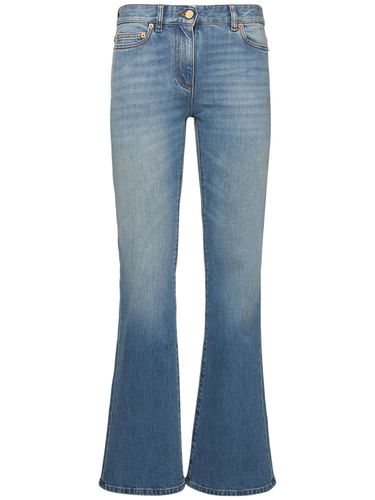 Chain Logo Flared Denim Jeans - VALENTINO - Modalova