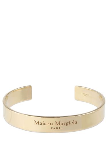 Logo Engraved Thick Cuff Bracelet - MAISON MARGIELA - Modalova