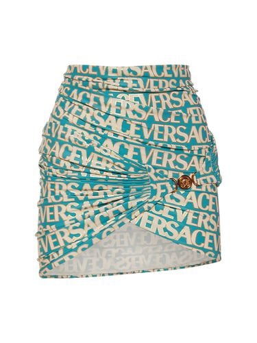 Logo Printed Jersey Mini Wrap Skirt - VERSACE - Modalova