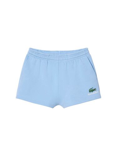 Lacoste Serif Disco Shorts - SPORTY & RICH - Modalova