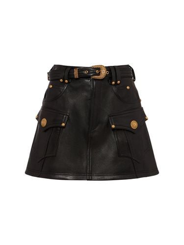 Trapeze Belted Leather Mini Skirt - BALMAIN - Modalova