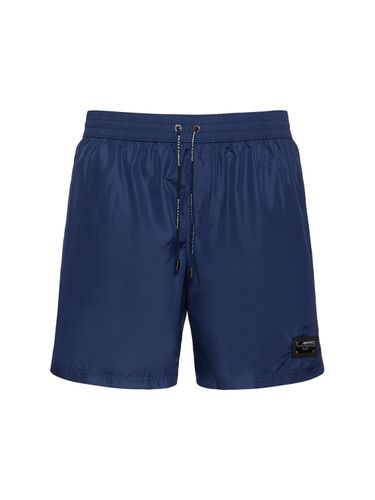 Solid Color Swim Shorts W/ Logo Plaque - DOLCE & GABBANA - Modalova