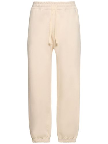 Compact Cotton Terry Sweatpants - JIL SANDER - Modalova