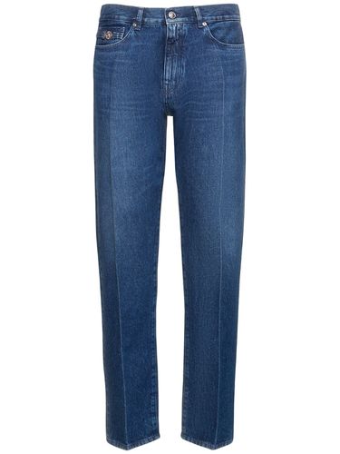 Stonewashed Cotton Denim Straight Pants - VERSACE - Modalova