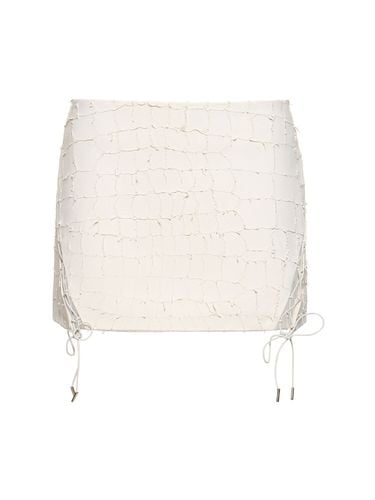 Snake Etched Leather Mini Skirt - DION LEE - Modalova