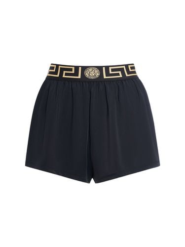 Greca Lycra Shorts - VERSACE - Modalova