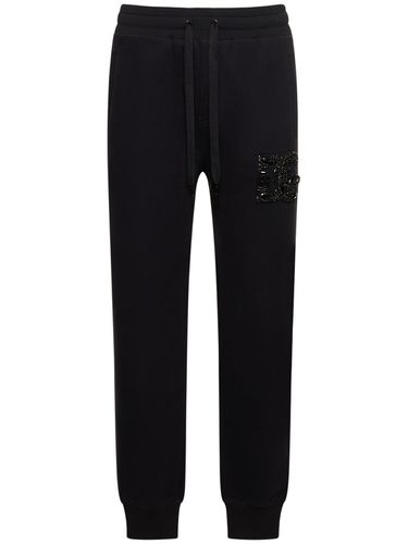 Cotton Logo Sweatpants With Stones - DOLCE & GABBANA - Modalova