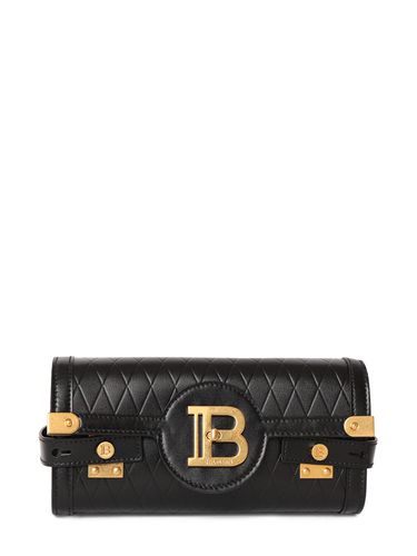 B-buzz 23 Embossed Leather Clutch - BALMAIN - Modalova