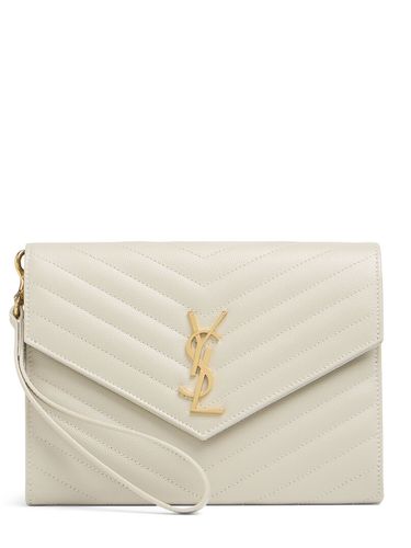 Cassandre Embossed Leather Clutch - SAINT LAURENT - Modalova