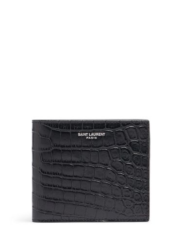 East West Embossed Leather Wallet - SAINT LAURENT - Modalova