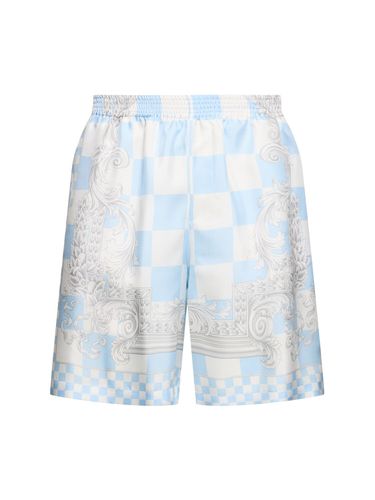 Shorts In Twill Di Seta Stampata - VERSACE - Modalova