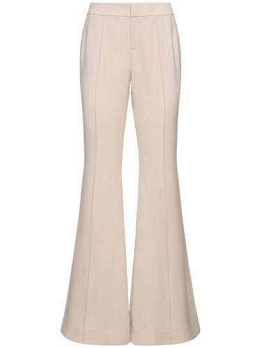 Low Waist Tech Flared Pants - MITHRIDATE - Modalova