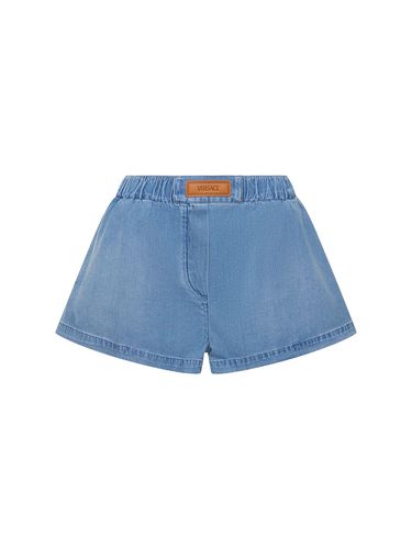 Stonewashed Denim Shorts - VERSACE - Modalova