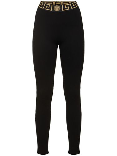 Leggings In Jersey Con Logo - VERSACE - Modalova