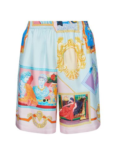 Shorts In Twill Di Seta Stampato - VERSACE - Modalova