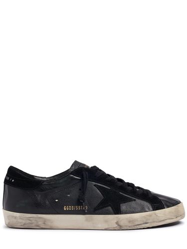 Mm Super Star Leather & Suede Sneakers - GOLDEN GOOSE - Modalova