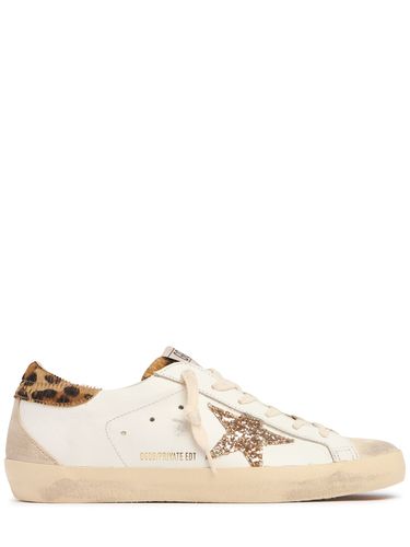 Lvr Exclusive Super-star Suede Sneakers - GOLDEN GOOSE - Modalova