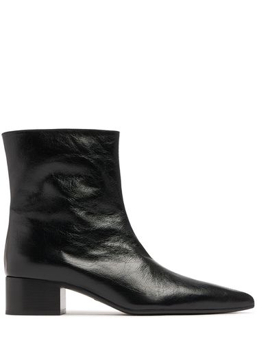 Mm Andee Glazed Leather Ankle Boots - KHAITE - Modalova