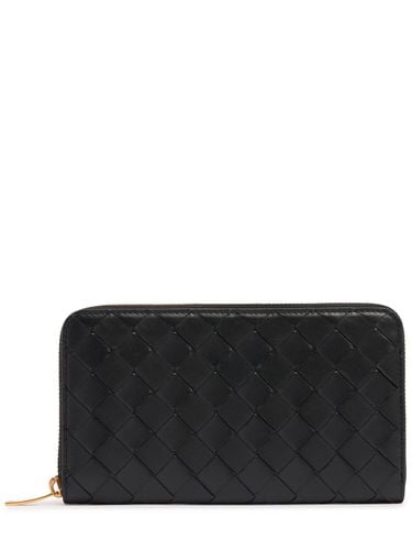 Intrecciato Leather Zip Around Wallet - BOTTEGA VENETA - Modalova