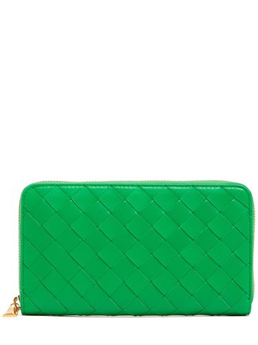 Intrecciato Leather Zip Around Wallet - BOTTEGA VENETA - Modalova