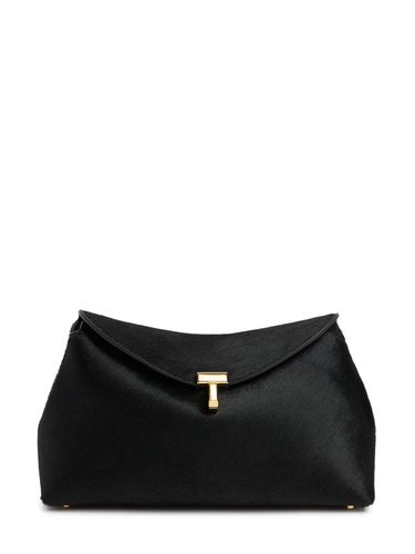 T-lock Pony Hair Leather Clutch - TOTEME - Modalova