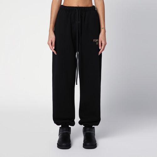 Black jogging trousers with logo - Fear of God Essentials - Modalova