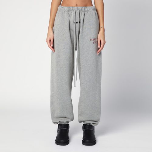 Grey jogging trousers with logo - Fear of God Essentials - Modalova