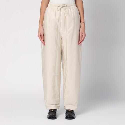 Cream coloured Re-Nylon trousers - Prada - Modalova