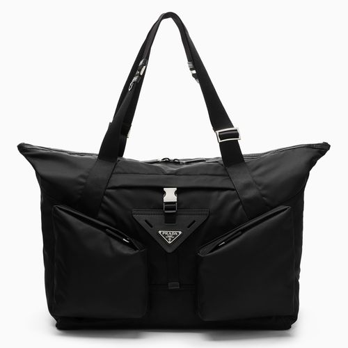 Reisetasche aus Re-Nylon und schwarzem Leder - Prada - Modalova