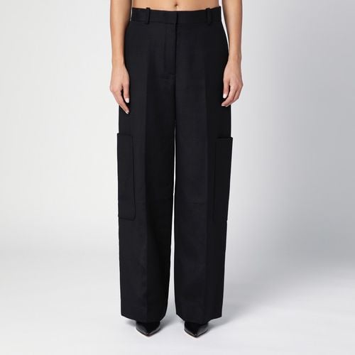 Black Caiton high-waisted trousers - Khaite - Modalova