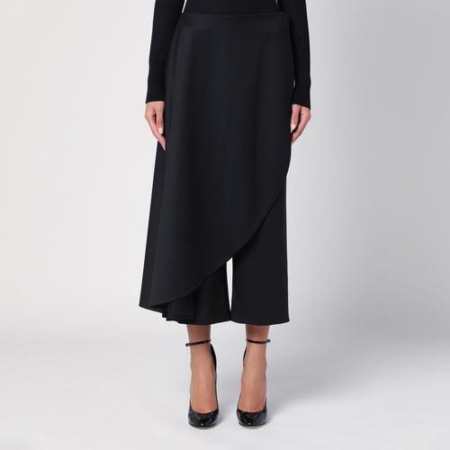 Black asymmetrical trouser skirt - Alaïa - Modalova