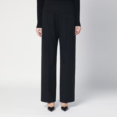 Black virgin wool trousers - Alaïa - Modalova