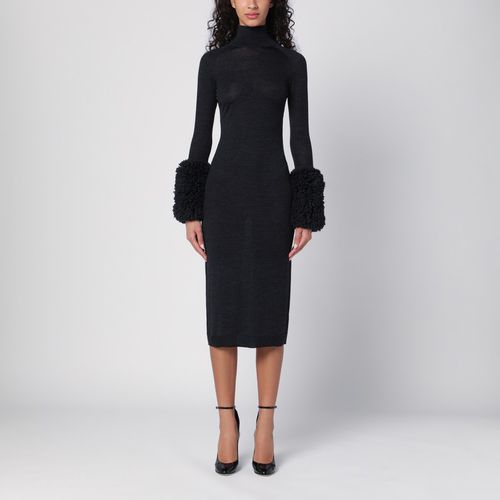 Black knit dress with balloon cuffs - Alaïa - Modalova